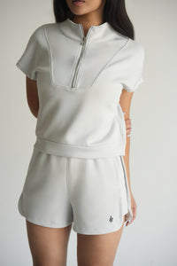 Serpente Zip Polo Crop Top – Mist White