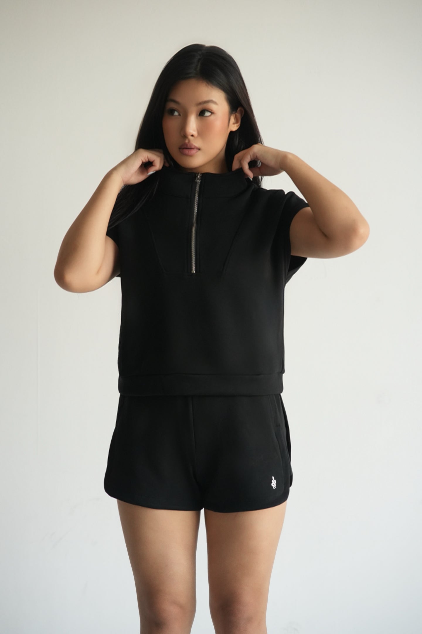 Serpente Zip Polo Crop Top – Black